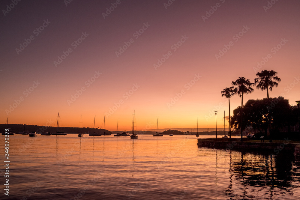 harbour foreshore and yachts at dawn