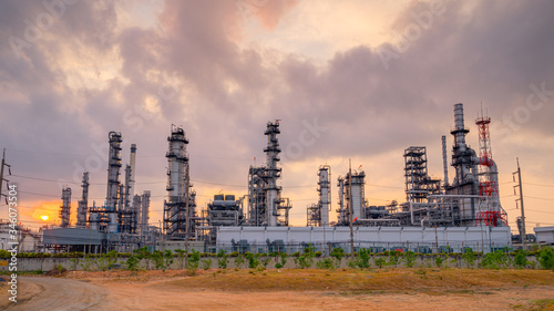 Oil Refinery, Chemical & Petrochemical plant abstract at twilight.