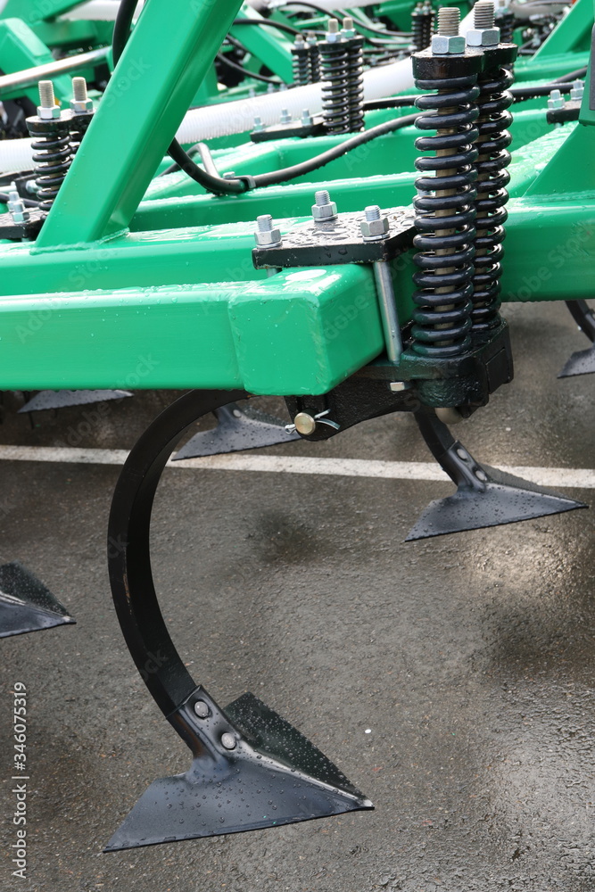 Parts and components of agricultural machines. Plough. Harrow. Cultivator. Fragment. Parts and components of agricultural machines. Plough. Harrow. Cultivator. Fragment.
