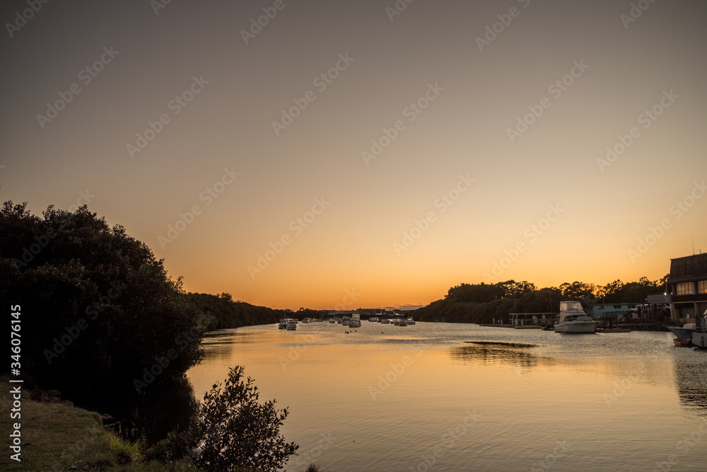 dawn on the river with boats dawn on the river with boats