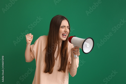 Emotional young woman with ...