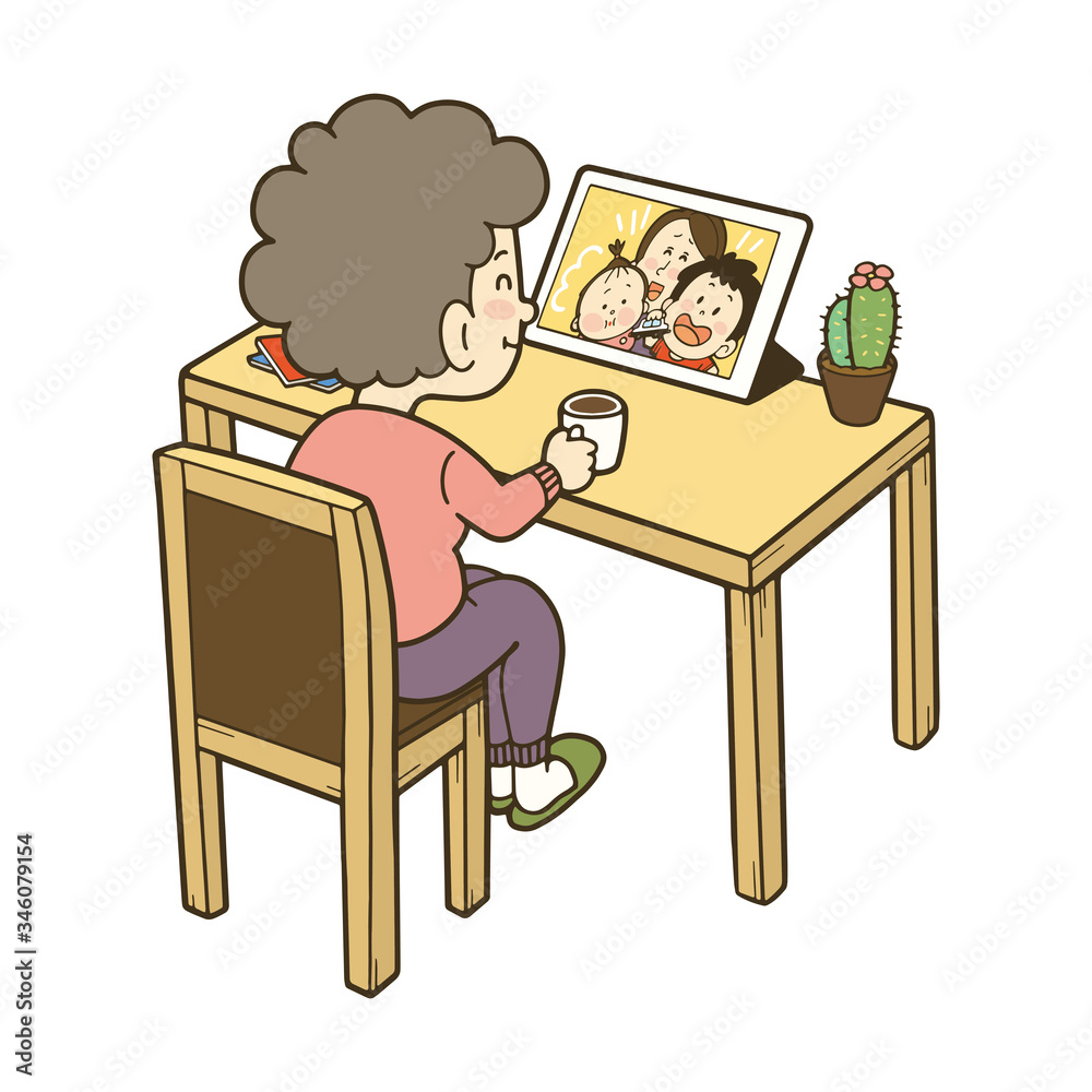 オンラインで孫たちと話す祖母 オンラインで孫たちと話す祖母