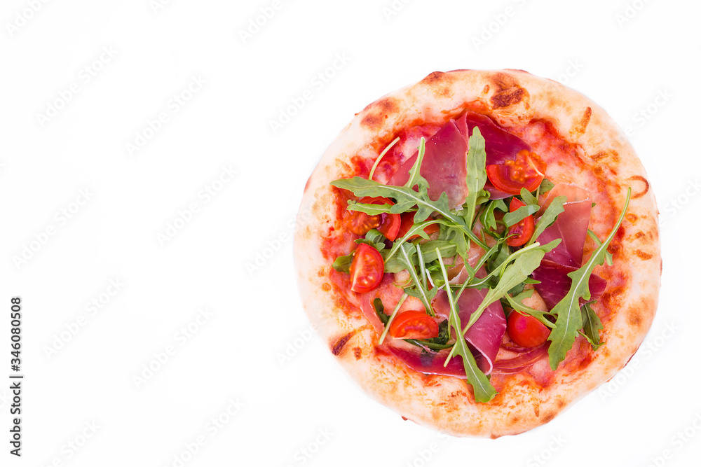 Pizza with ham, tomatoes, arugula and mushrooms on a white background. Pizza with ham, tomatoes, arugula and mushrooms on a white background.