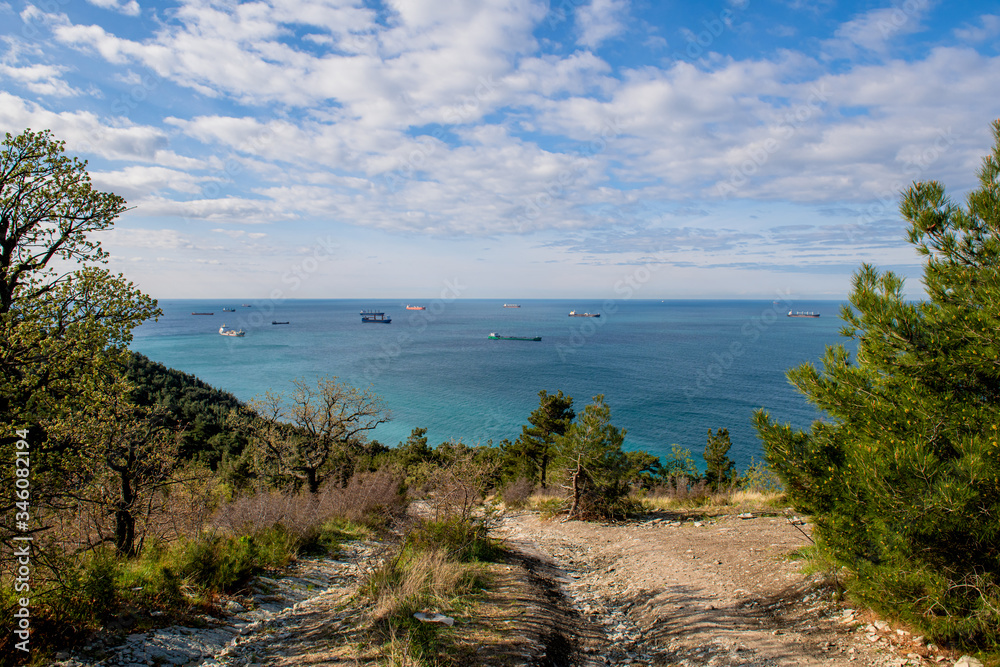 Roadstead in Black Sea. Ship parking near the port. Panoramic view of the sea from above.