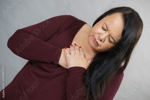 Adult woman having pain in chest