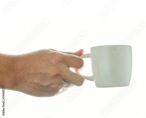 hand holding a cup