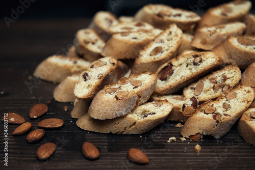 Homemade Italian cookies cantuccini and almond seeds on the table