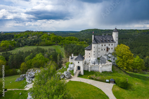 Aerial view of Castle Bobolice, one of the most beautiful fortresses on the Eagles Nests trail. Medieval fortress in the Jura region near Czestochowa. Poland.