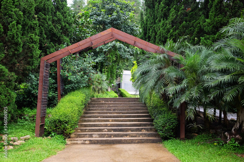Cement stairs and Gables steel frame decorative in tropical garden at Thailand
