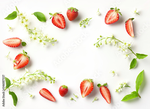 Fototapeta Naklejka Na Ścianę i Meble -  blooming bird cherry and strawberries
