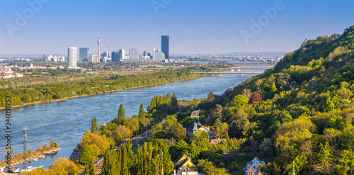 Danube river with bridges and skyline of Vienna, Austria photo