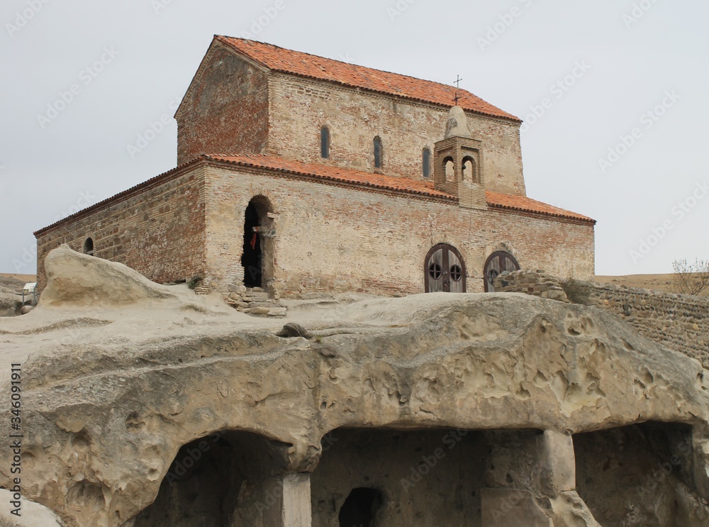 stone two story castle Church in the cave city of Queen Tamara Georgia