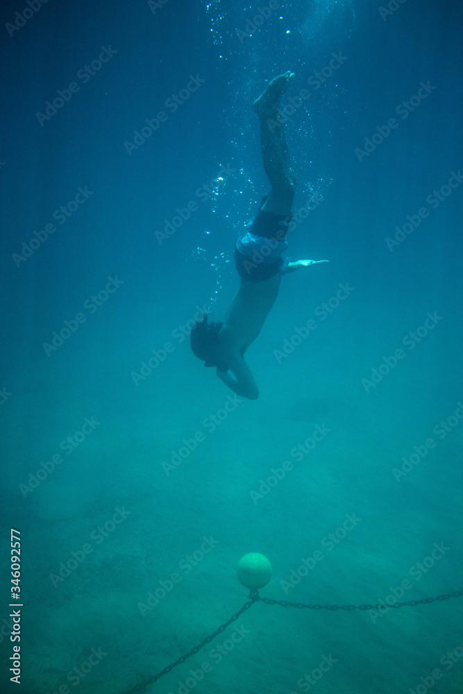 Diving in clear water Diving in clear water
