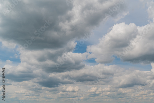 A low angle shot of a beautiful cloudscape on a blue sky background