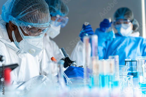 virus experts test for coronavirus covid 19 vacinne in laboratory
