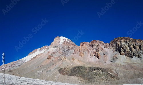 Georgia, Caucasus Kazbek. Glacier at the approach to Kazbek. View on Kazbek.