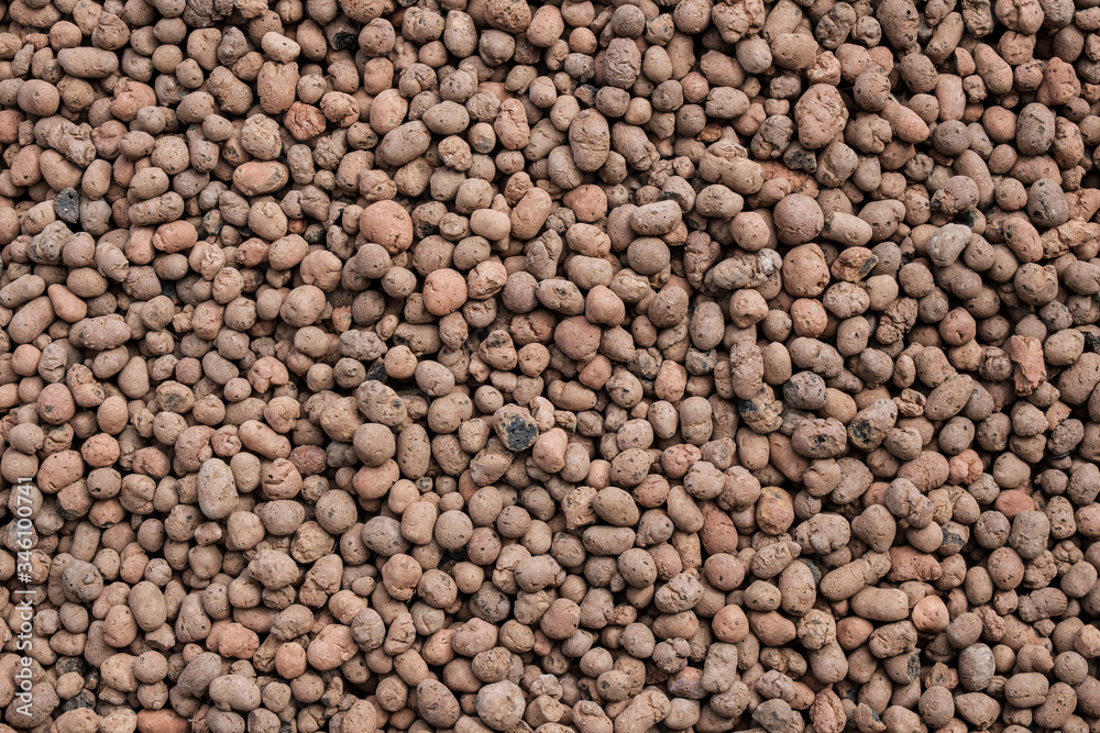 Top view on a seamless abstract background from expanded clay. Flat lay. Top view on a seamless abstract background from expanded clay. Flat lay.