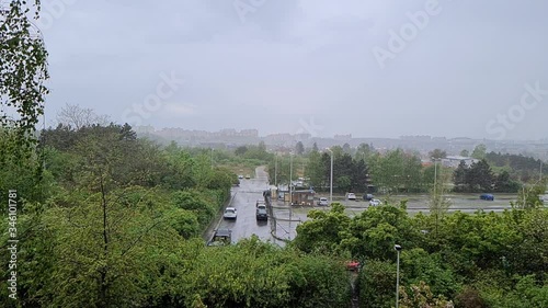 Slow motion of heavy rain in city. Falling rain in slow motion.