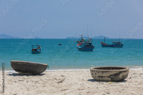 Fototapeta Naklejka Na Ścianę i Meble -  traditional round fishing boats and ships in a Vietnam