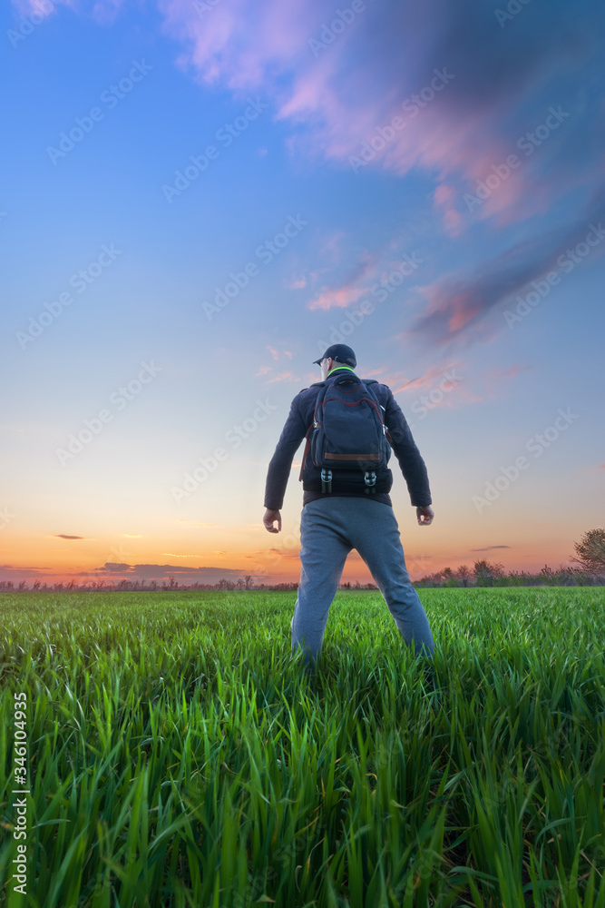man looks at the sky / bright spring landscape man looks at the sky / bright spring landscape