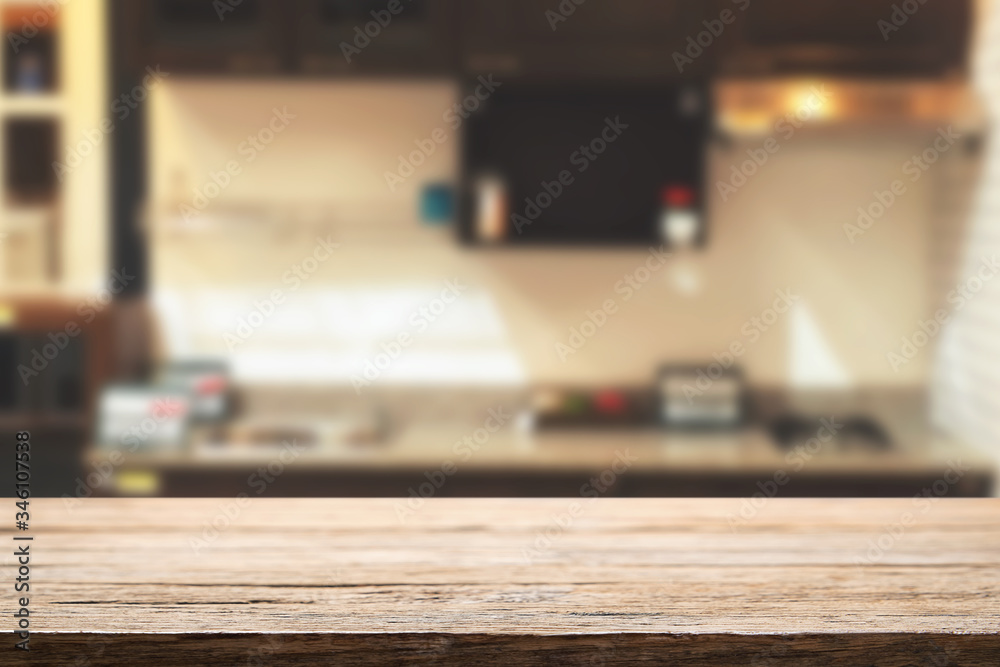 Wood desk space and blurred of kitchen background. for product display montage. business presentation. Wood desk space and blurred of kitchen background. for product display montage. business presentation.