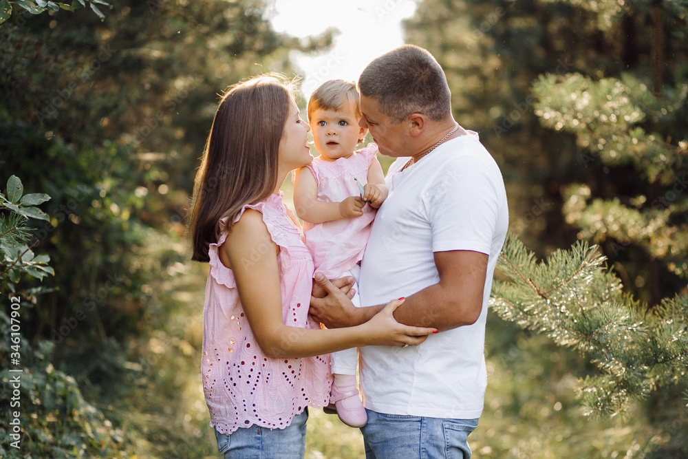 Fototapeta premium Happy family outdoors spending time together