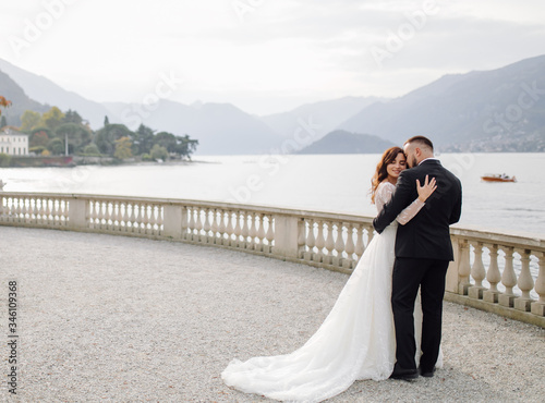 Happy wedding couple in Como Lake, Italy