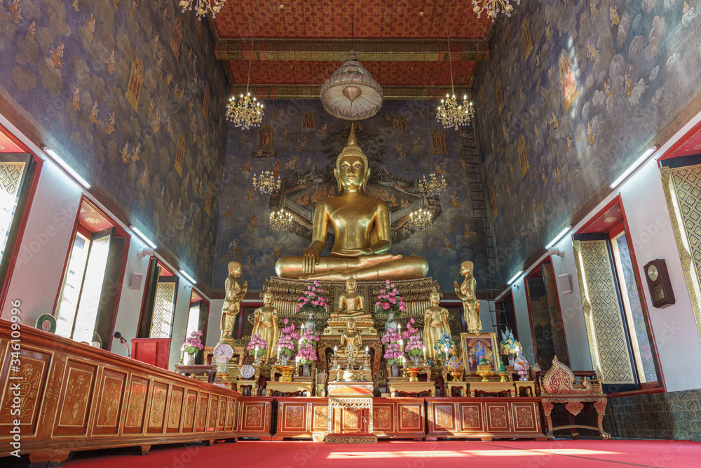 Golden buddha inside thai church Wat Ratchanatdaram Temple in Bangkok Thailand