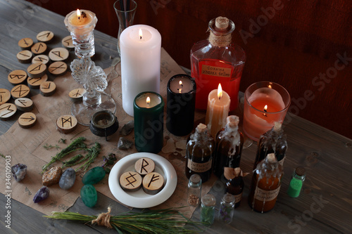 magic ritual with runes and pentagram and magical attributes