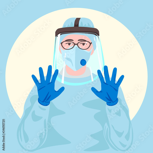 A doctor or a nurse wearing protective medical face mask, face shield, protective gown and medical disposable blue gloves