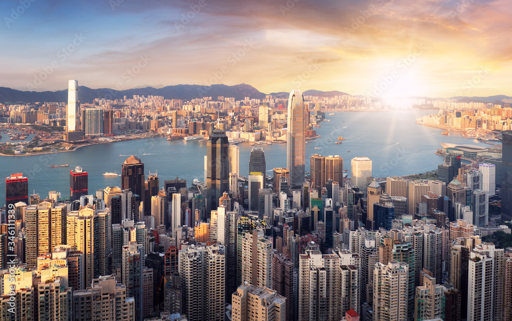 Hong Kong at dramatic sunset, China skyline - aerial view