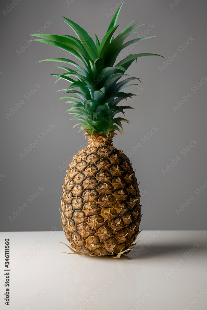 Ripe pineapple with beautiful green leaves