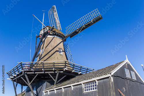 Historic windmill in the center of Woudsend, Netherlands