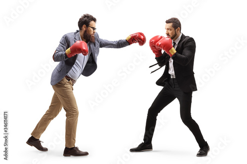 Two men in formal clothes having a fight with boxing gloves