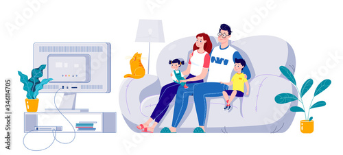 Family watching a movie on a big screen, sitting on a sofa at home. Self-isolation at home.
