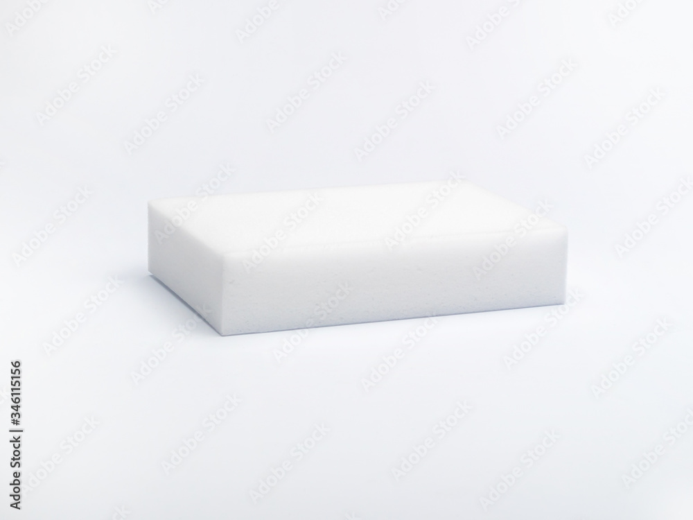 white sponge made of a porous material for careful washing of various surfaces white sponge made of a porous material for careful washing of various surfaces