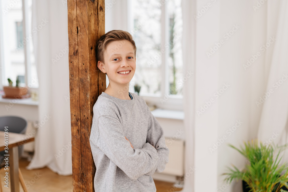 Happy relaxed young boy with a friendly smile Happy relaxed young boy with a friendly smile