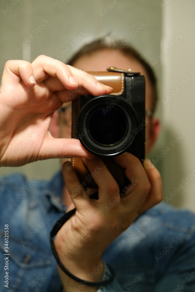 camera in hand of the photographer