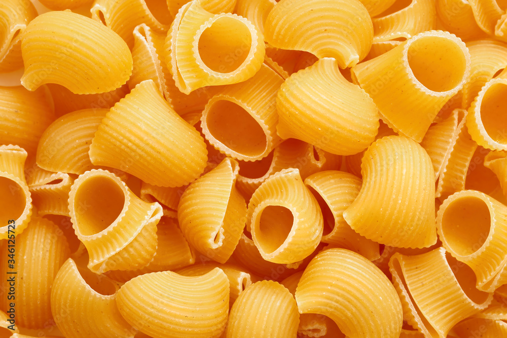Heap of raw pipette rigate pasta Heap of raw pipette rigate pasta