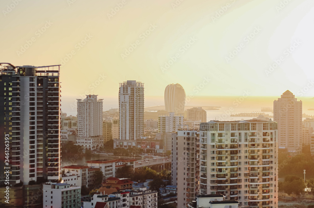 Obraz premium Cityscape at sunset in the city of Sanya. Hainan island