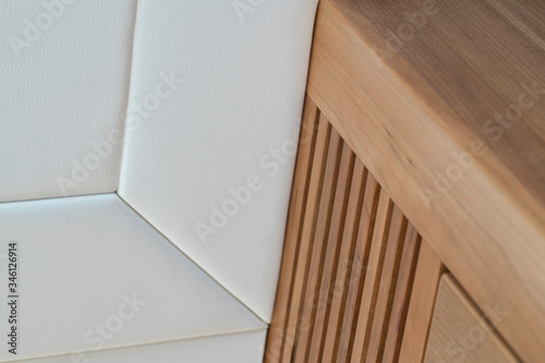 Furniture details aboard a luxury Yacht. Interior. Yachting. Boat. Shipbuilding Industry. Wooden panels and upholstery. Interior design.