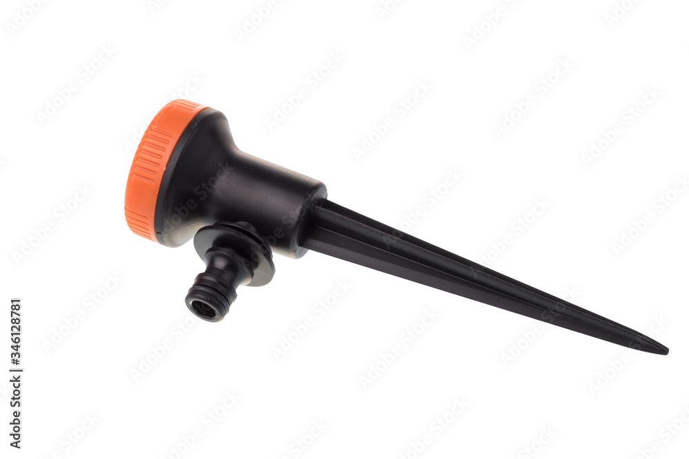 Side view of a black plastic garden sprinkler for irrigation with orange head and multiple water modes, isolated on white background Side view of a black plastic garden sprinkler for irrigation with orange head and multiple water modes, isolated on white background