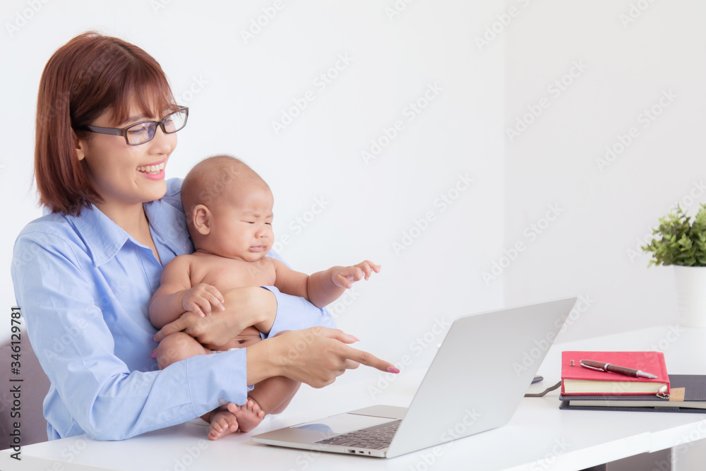 Asian mother stop working pay attention to crying baby, baby get sick naughty mother on desk with laptop multitask motherhood take care toddler at home office, small business entrepreneur feeding baby Asian mother stop working pay attention to crying baby, baby get sick naughty mother on desk with laptop multitask motherhood take care toddler at home office, small business entrepreneur feeding baby