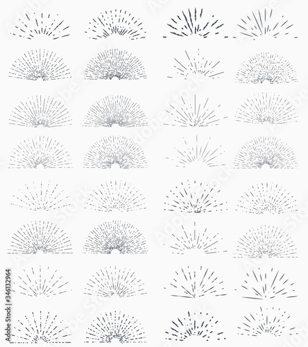 Set of vintage hand drawn sunburst rays design elements, halves, explosion, fireworks, black rays, illustration.