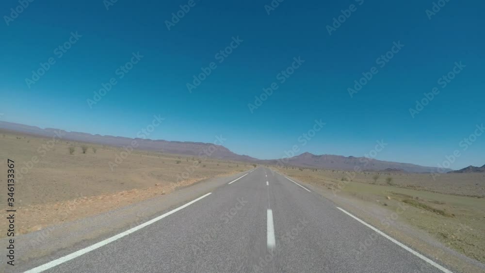 POV Camera car on empty mountain road. Atlas mountain path in Morocco POV Camera car on empty mountain road. Atlas mountain path in Morocco