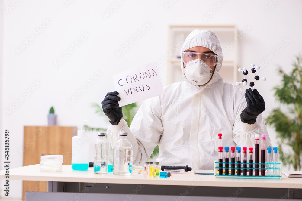Doctor working in lab in coronavirus COVID-19 concept Doctor working in lab in coronavirus COVID-19 concept