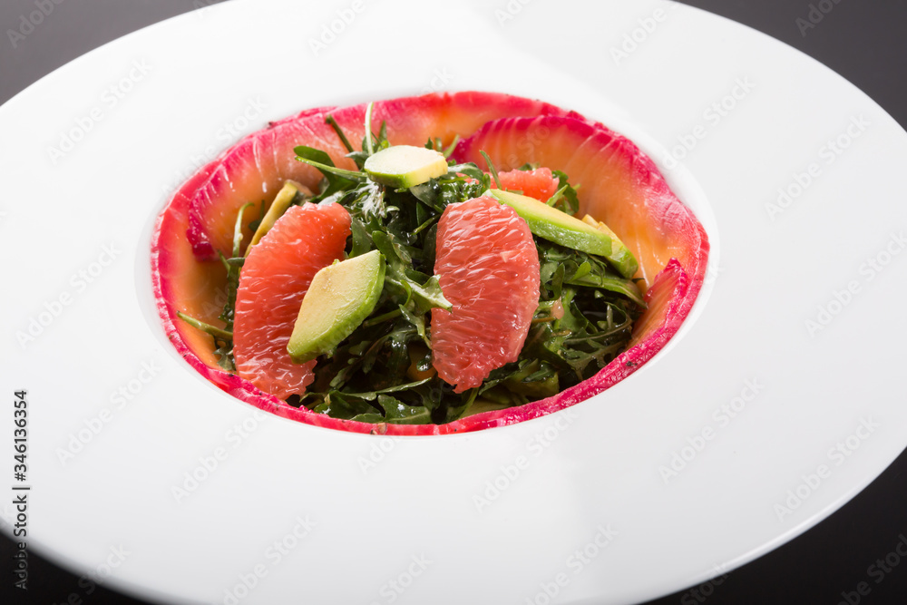Smoked salmon salad with arugula, grapefruit and avocado Smoked salmon salad with arugula, grapefruit and avocado