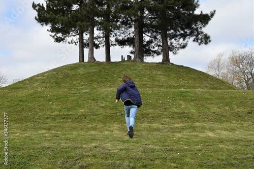 View of boy walking from behind