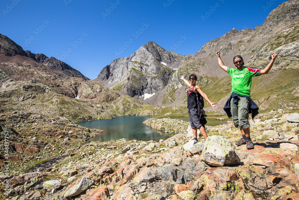 A couple of mountaineers in the Ibon de Panticosa in the Pyrenees, Aragon. Spain