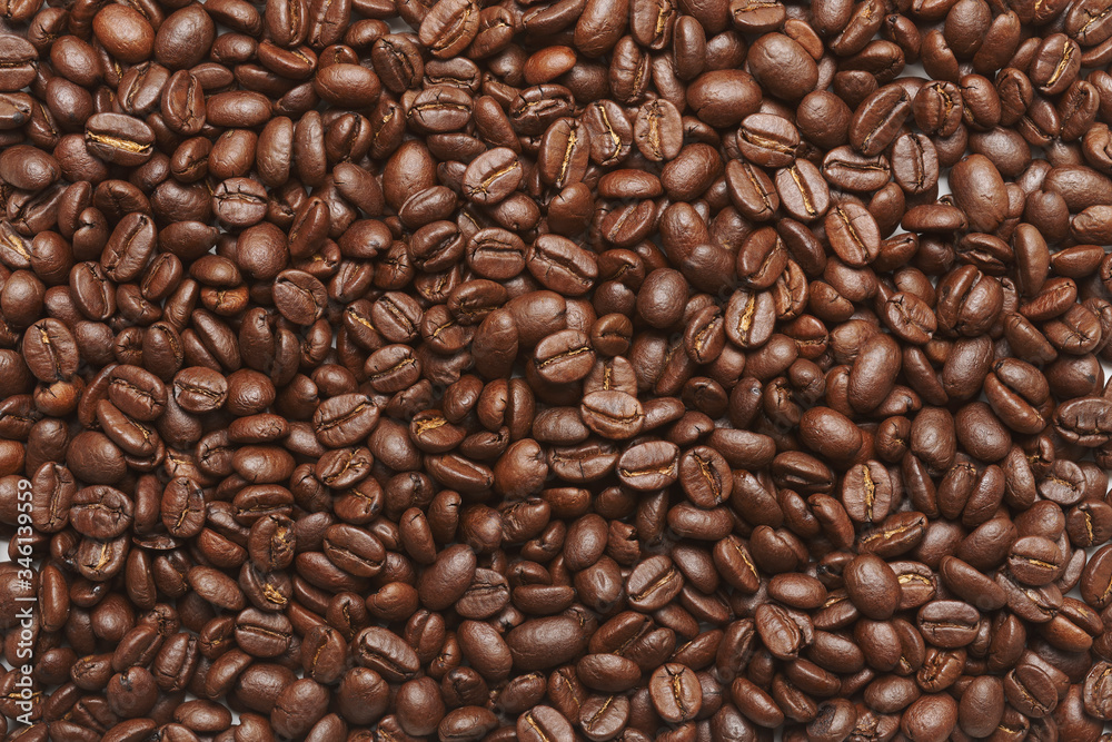Fototapeta premium Freshly roasted coffee beans background